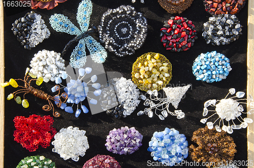 Image of Decorative handmade jewelry sold at market fair 