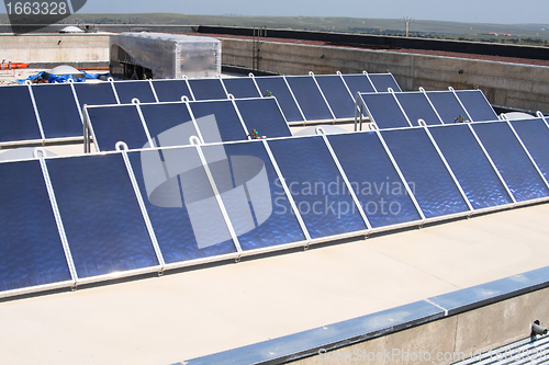 Image of solar panels on roof boards 