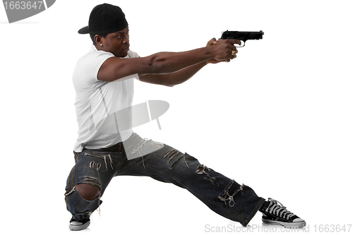 Image of Young thug with a gun