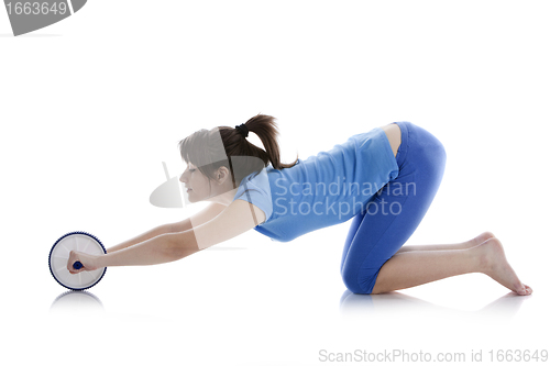 Image of Girl with a gymnastic roller