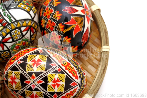 Image of paited eggs in basket