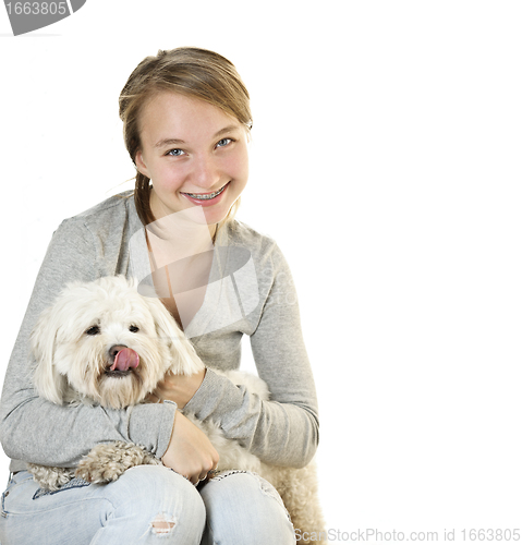 Image of Teen girl with cute dog