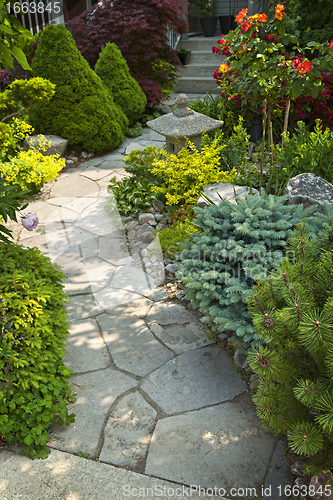 Image of Garden path with stone landscaping