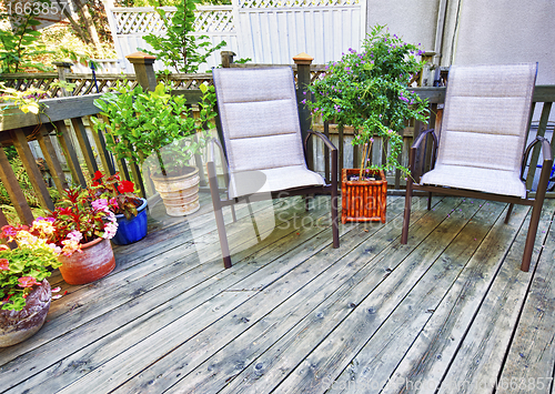 Image of Chairs on wooden deck