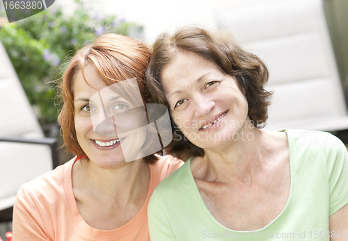 Image of Mature mother and daughter