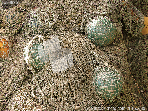 Image of glass float, old fishing nets