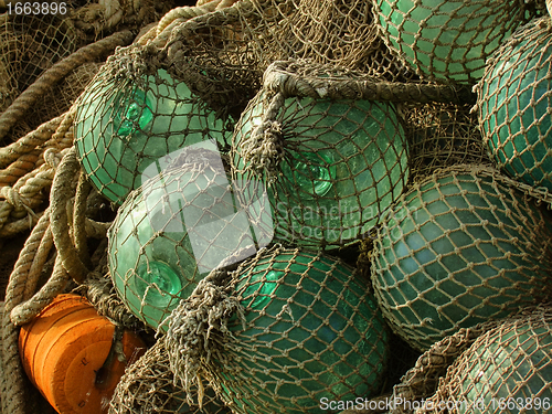 Image of glass float, old fishing nets