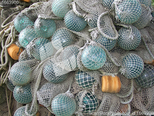 Image of glass float, old fishing nets