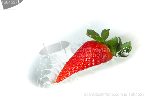 Image of strawberry splashing into milk