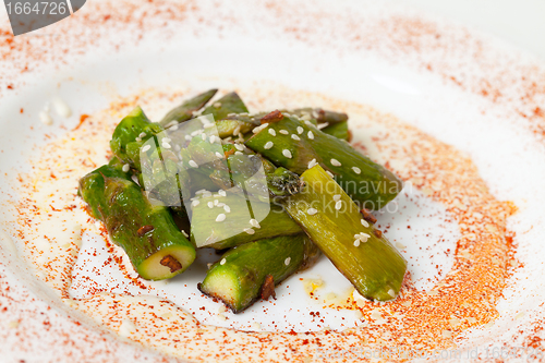 Image of Fried Asparagus on white plate