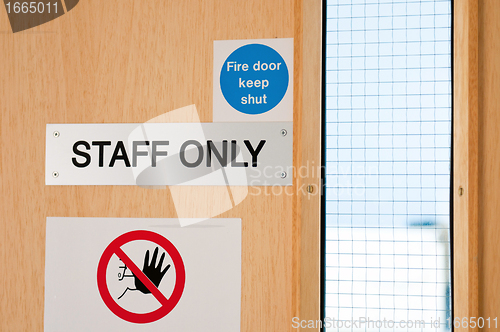 Image of Staff only signs at laboratory