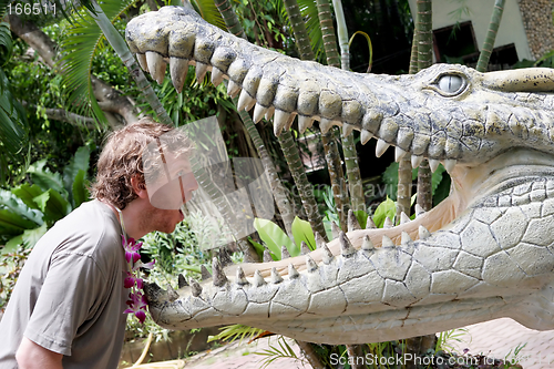 Image of Man versus crocodile