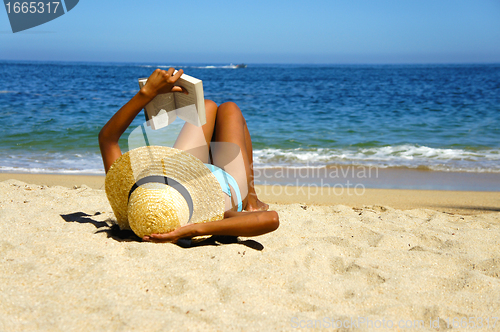 Image of Woman reading a book 