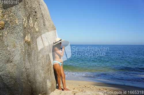 Image of Girl looking at the ocean