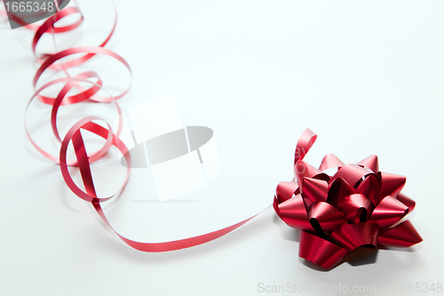 Image of Christmas decoration, red ribbon