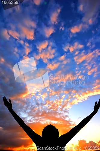 Image of Hands up to the sky showing happiness