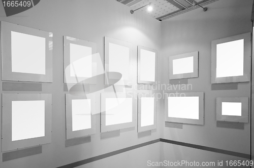 Image of Blank picture frames in art gallery