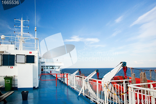 Image of Ship deck view, ocean in a sunny day