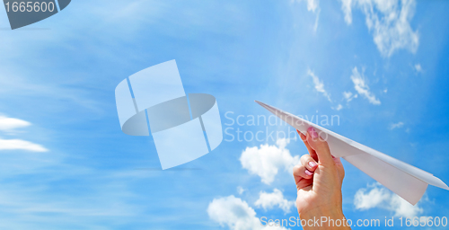 Image of Throwing a paper plane in the sky