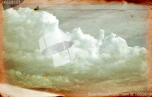 Image of Clouds on old grunge paper