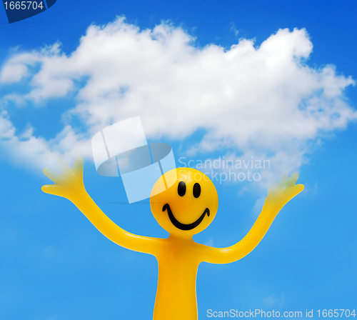 Image of A happy face holding a cloud