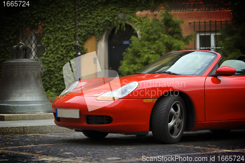 Image of Sport car in the old town scenery