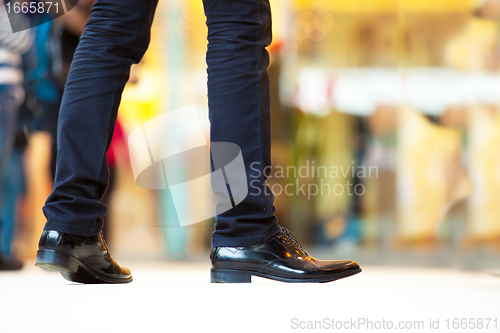 Image of People in rush in shopping mall