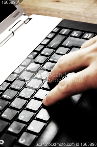 Image of Typing on laptop