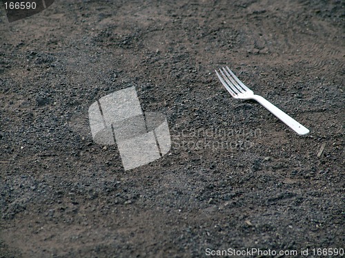 Image of Plastic fork on ground