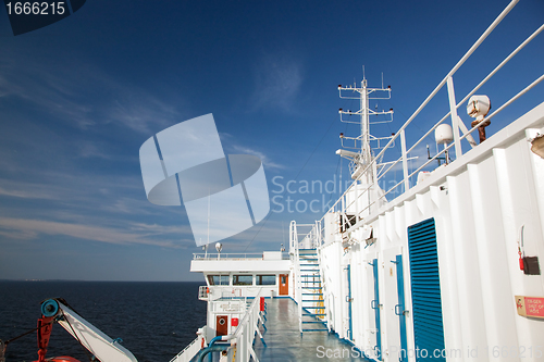 Image of Ship deck view, ocean in a sunny day