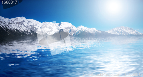 Image of Snowy winter mountains. Abstact water