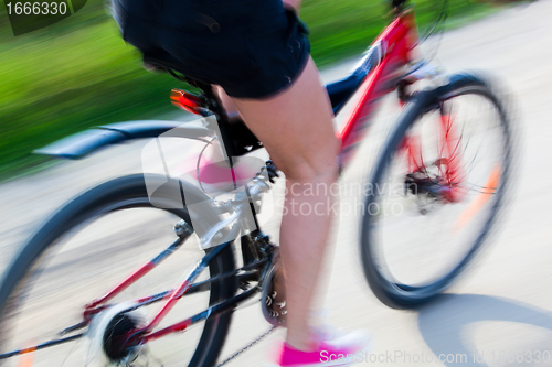 Image of Active woman on a bike