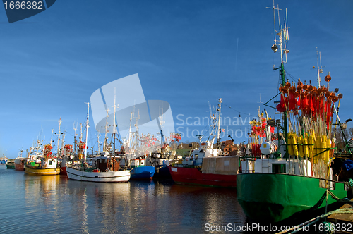 Image of Small ships in a charming harbor