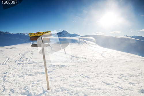 Image of The signpost in the winter mountains