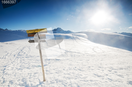 Image of The signpost in the winter mountains