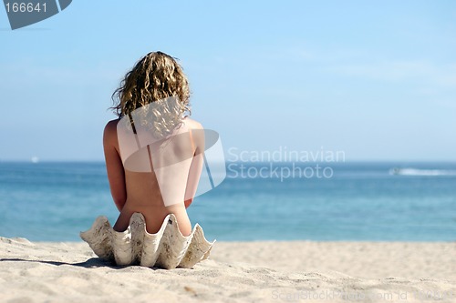 Image of Blond girl on the beach