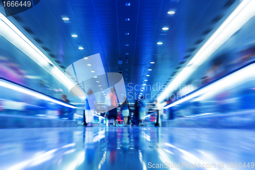 Image of People rush in subway.