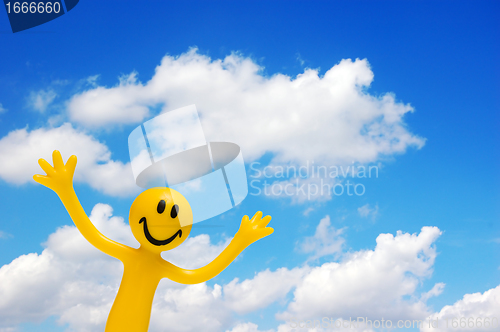Image of A happy face and blue sky