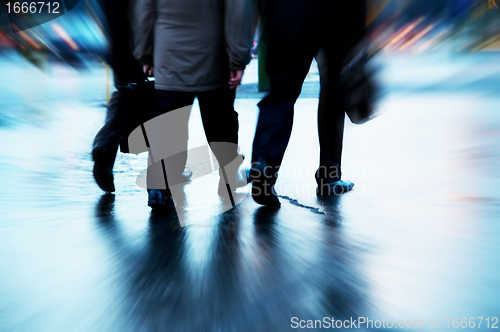 Image of Busy business people walking