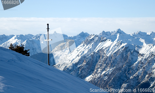 Image of Winter mountains with cross