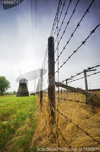 Image of Barbed wire fence to prison