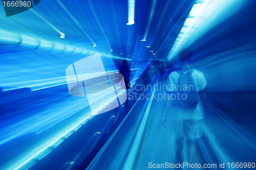 Image of People rush in subway.