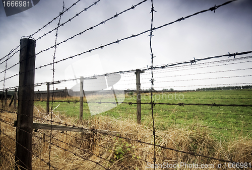 Image of Barbed wire fence to prison