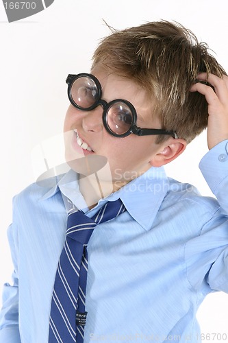 Image of School student in comical spectacles and a confusedl expression