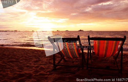 Image of Deckchairs at Sunset