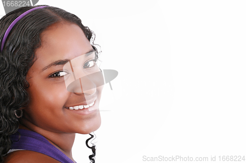 Image of Beautiful smiling face of a happy African teenager girl, isolate