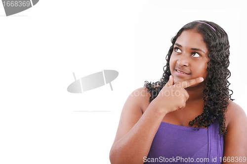 Image of Portrait of teenage girl smiling and looking away