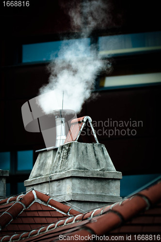 Image of Small chimney with smoke