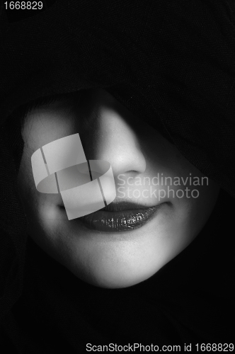 Image of Woman in black hood