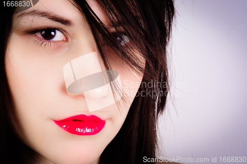 Image of Closeup photo of a woman with red lips